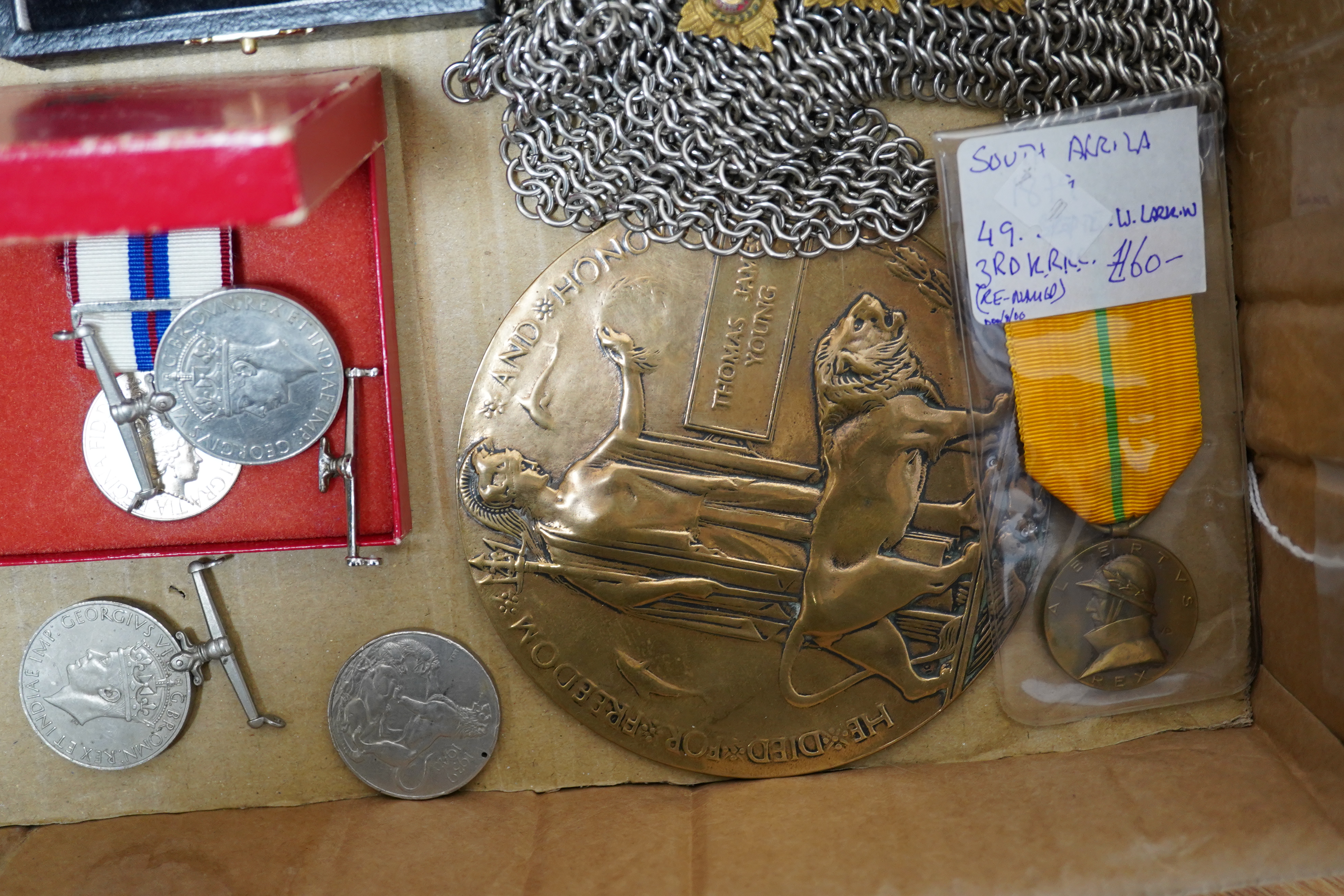 A collection of medal related items, etc., including